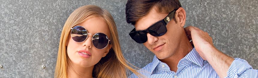 Man and woman wearing sunglasses