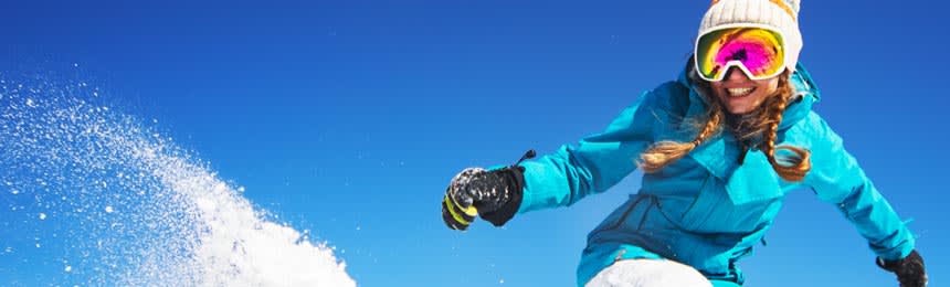 Woman skiing with goggles