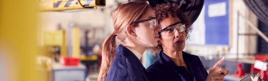 Women at work wearing safety glasses