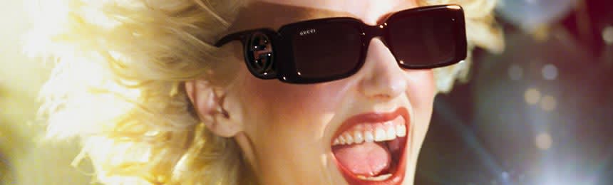 Woman wearing Gucci sunglasses