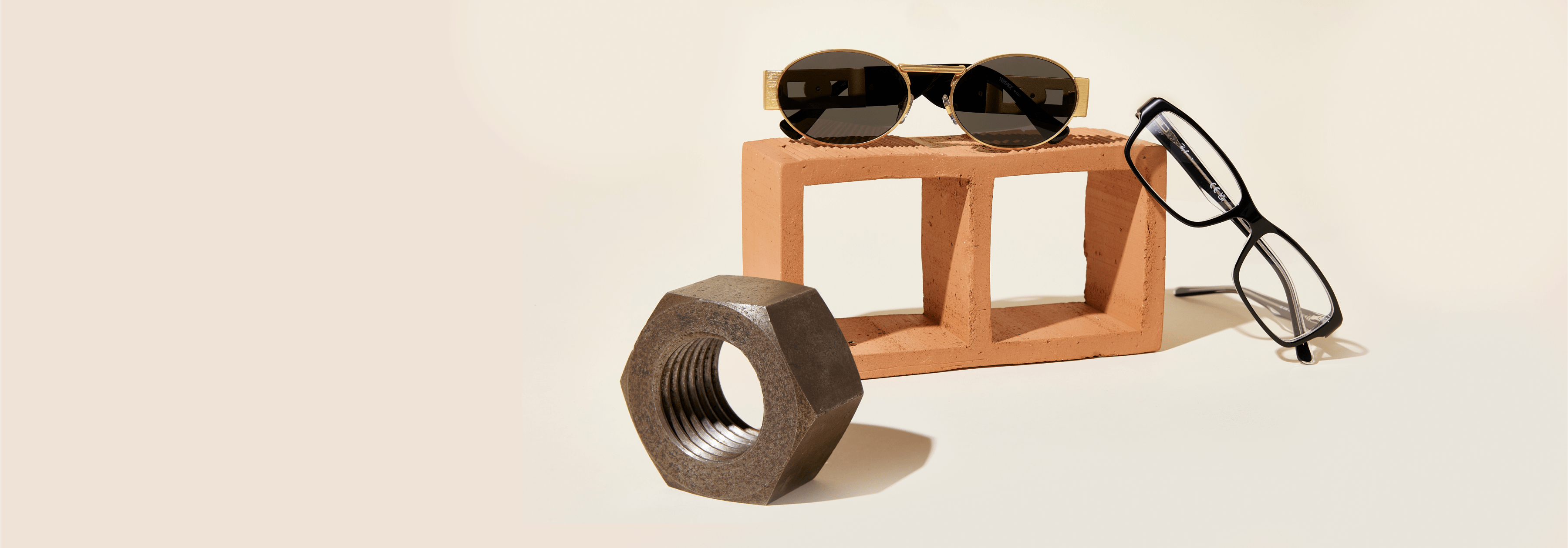 One the left there are Versace ve2264 Sunglasses and on the right Ray-Ban rb5114 Eyeglasses
